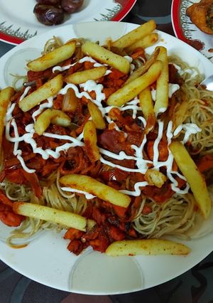 A picture of Tandoori chicken noodles.