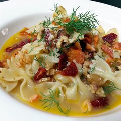 A picture of Salmon And Spice Carrot With Farfalla Pasta.