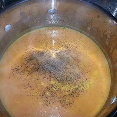 A picture of Carrot Soup w/ Coconut and Lemongrass.
