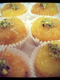 A picture of Mini kunafa with cream.