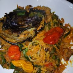 A picture of Palm oil jallof rice with Dry Fish.