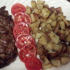 A picture of Garlic and herb potatoes.