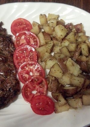 A picture of Garlic and herb potatoes.