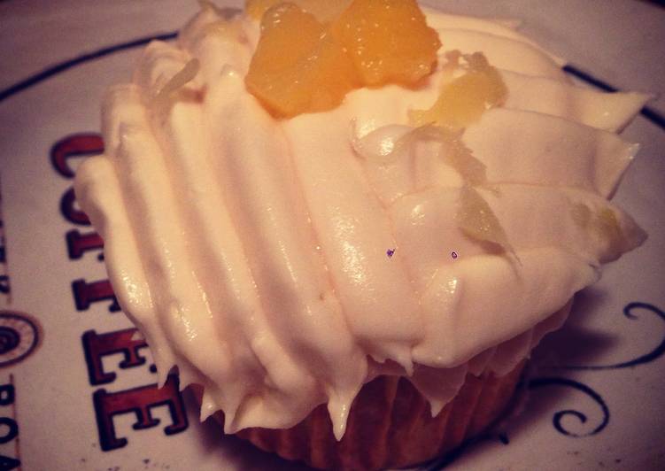 Pineapple & Coconut Cupcake W/ Coconut Frosting & Pineapple Shredding On Top Pineapple & Coconut Cupcake W/ Coconut Frosting & Pineapple Shredding On Top