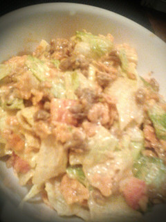 A picture of Taco salad, dorito style!.