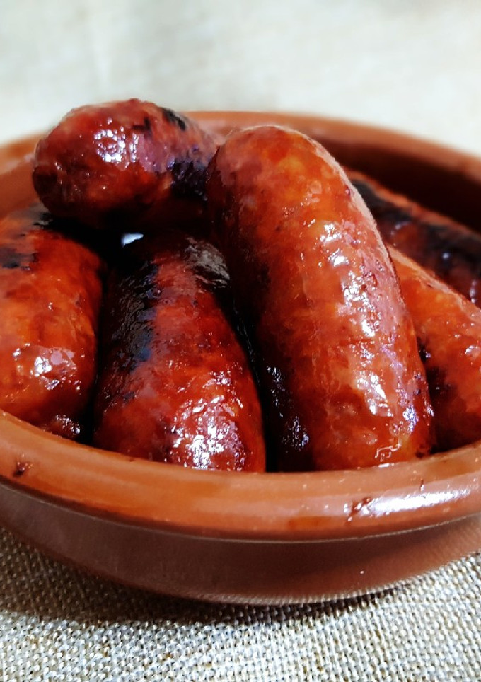 Una foto de Chorizos al vino