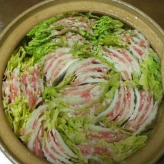 A picture of Mille-feuille Style Layered Chinese Cabbage and Pork Belly Hot Pot.
