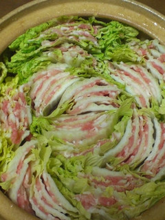 A picture of Mille-feuille Style Layered Chinese Cabbage and Pork Belly Hot Pot.