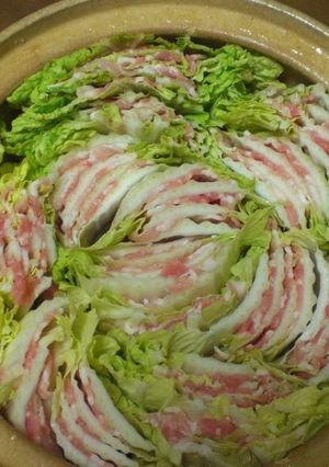 A picture of Mille-feuille Style Layered Chinese Cabbage and Pork Belly Hot Pot.