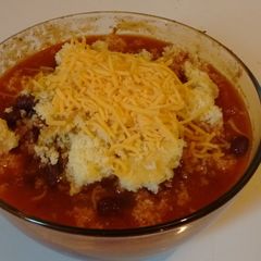 A picture of Homemade chili and Cornbread.