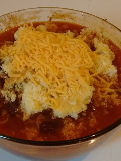 A picture of Homemade chili and Cornbread.