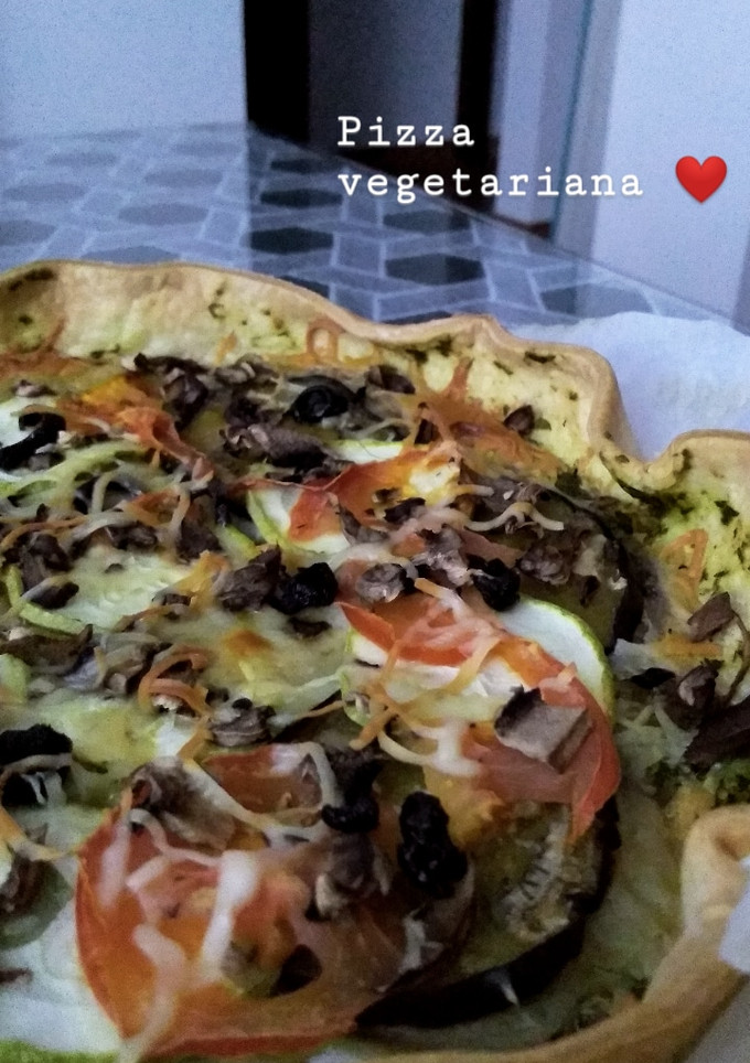 Una foto de Pizza vegetariana
