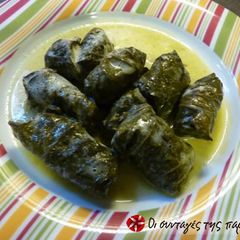 A picture of Dolmadakia with ground meat in egg and lemon sauce.