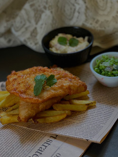 A picture of Fish & Chips with Tartar Sauce & Mushy Peas.
