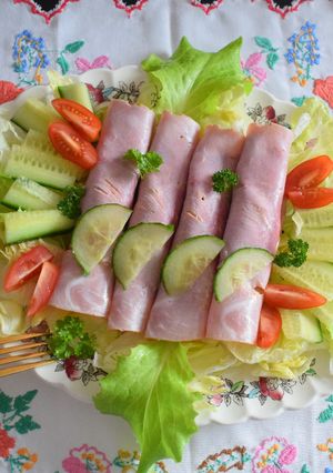 A picture of Ham rolls filled with mushrooms.