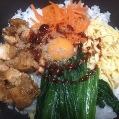 A picture of Bibimbap in a Frying Pan.