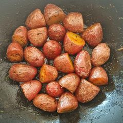 Garlic, dill and butter sautéed potatoes A picture of Garlic, dill and butter sautéed potatoes.