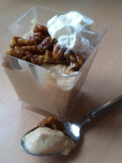 A picture of Vickys Pumpkin Pudding with optional Candied Pecans, GF DF EF SF.