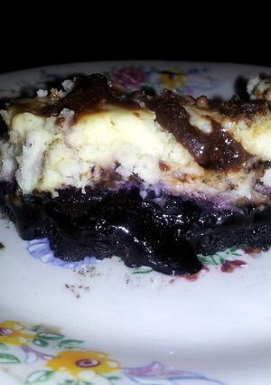 A picture of Blueberry oreo cheesecake bars.