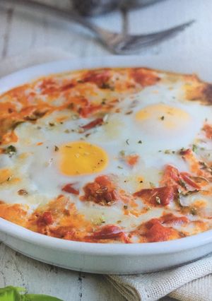 Una foto de Huevos con tomate