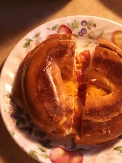 A picture of Grilled cheese and pepperoni bagel.