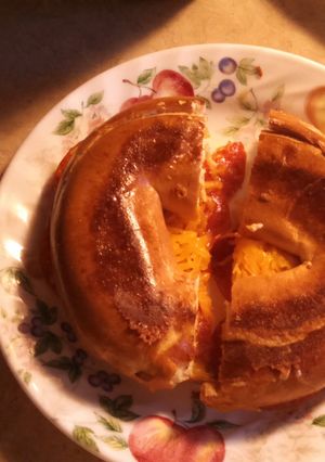 A picture of Grilled cheese and pepperoni bagel.