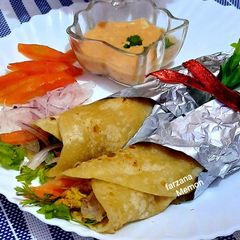 A picture of Chicken tikka paratha roll.