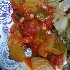 A picture of Zucchini with Tomatoes.