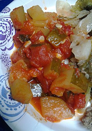 A picture of Zucchini with Tomatoes.