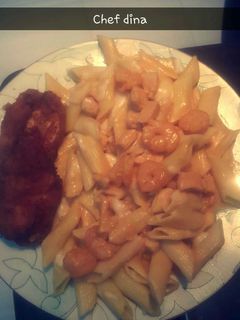 A picture of Pasta with pink sauce.