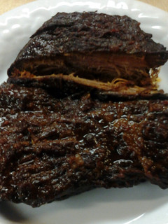 A picture of Sam's Crockpot Beef Brisket with Homemade Bbq Sauce.