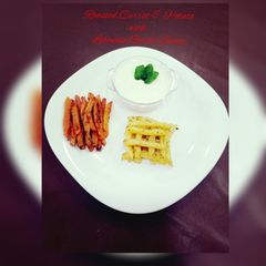 A picture of Roasted Carrots & Potatoes with Homemade Lebanese Garlic Sauce(toum).