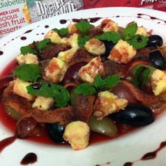 Pomegranate And Grape Jello Salad With Smoked Salmon A picture of Pomegranate And Grape Jello Salad With Smoked Salmon.