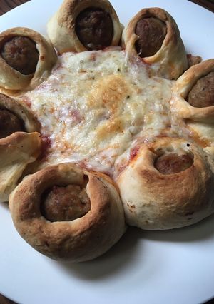 A picture of Meatball cheese pizza.