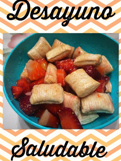 Una foto de Desayuno saludable: frutillas, cereales y miel