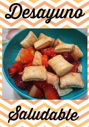 Una foto de Desayuno saludable: frutillas, cereales y miel