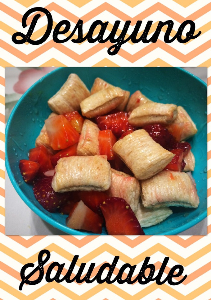 Una foto de Desayuno saludable: frutillas, cereales y miel