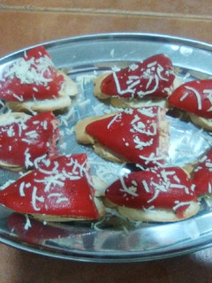 Una foto de Piquillos rellenos de Ibéricos