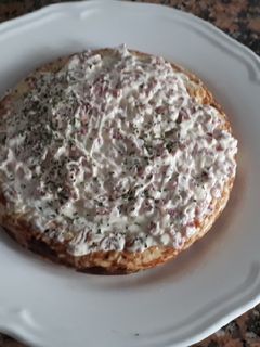 Una foto de Tortilla de patata con jamón y oli-oli