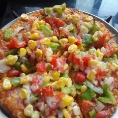 A picture of Kulcha paneer pizza.