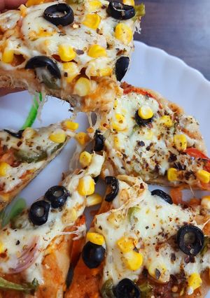A picture of Double Decker Wheat Base Pizza.