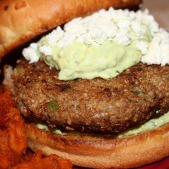 A picture of Turkey-Quinoa Burgers with an Avocado-Yogurt Sauce.