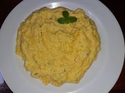 Una foto de polenta de queso parmesano