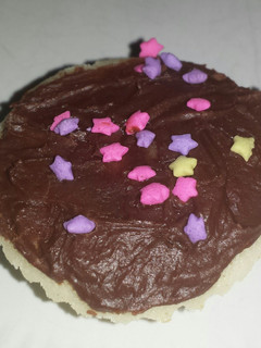 A picture of Dark chocolate frosting.