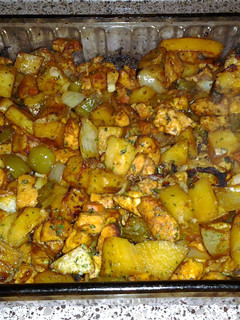 A picture of smokey chicken and veggies.