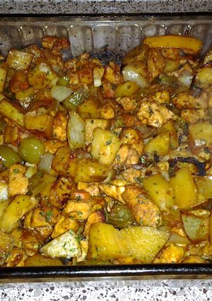 A picture of smokey chicken and veggies.