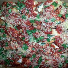 A picture of spinach & cheese stuffed shells.