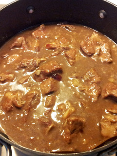 A picture of Beef with Red wine and Cranberry Sauce.