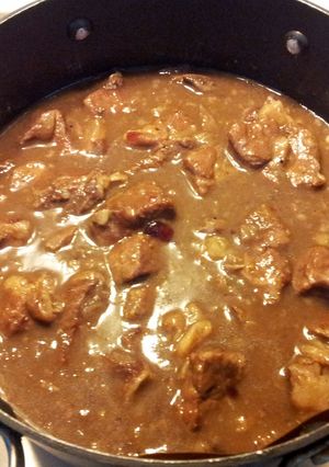 A picture of Beef with Red wine and Cranberry Sauce.