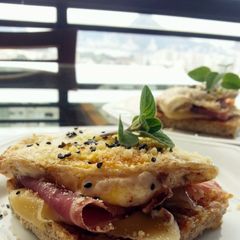 A picture of Parma and egg toast.